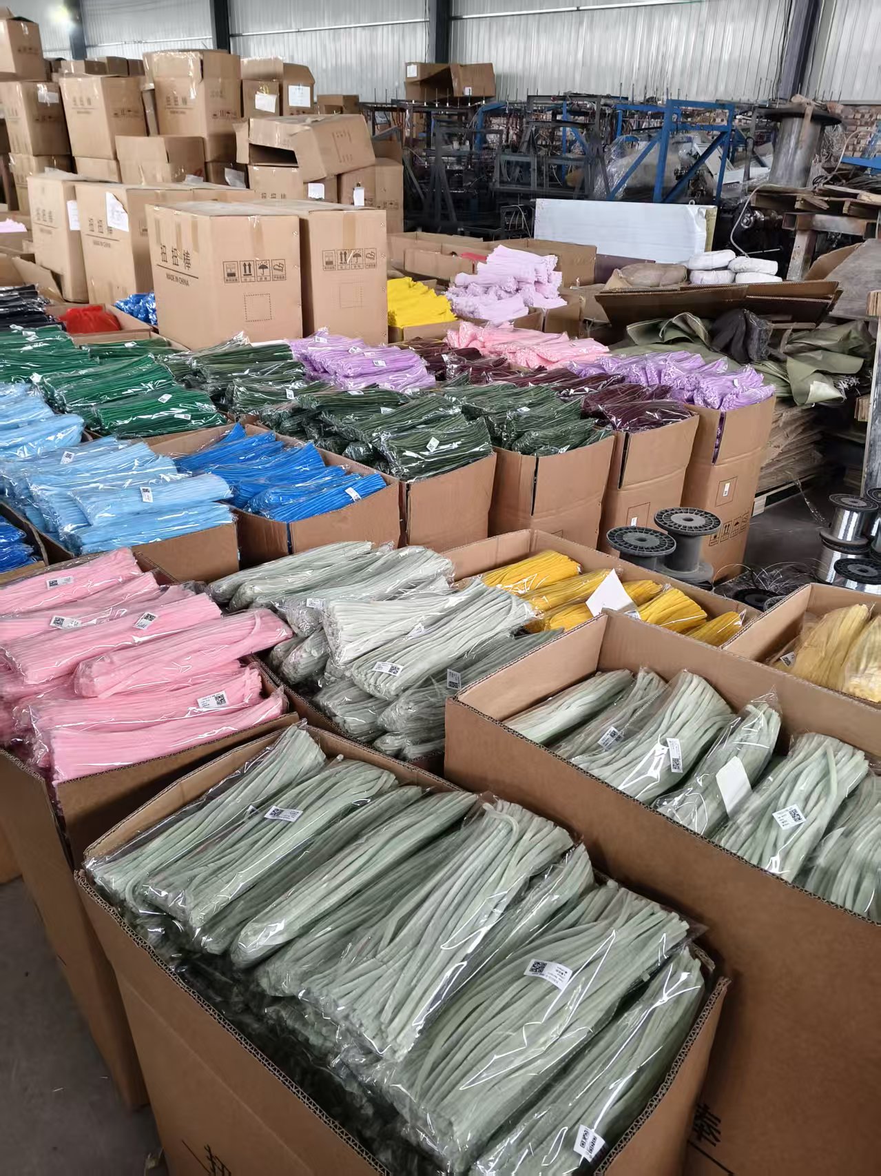 Solid color chenille stem assortment packed in cartons